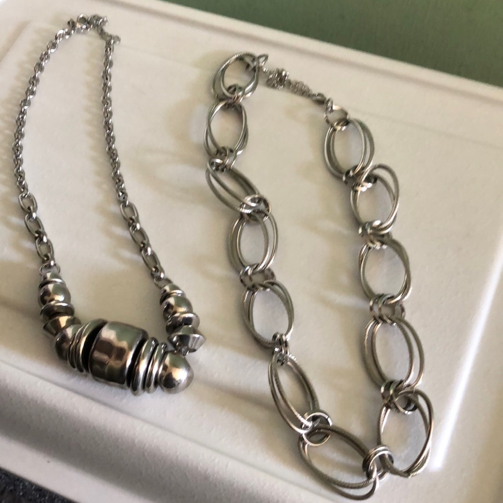 2 statement silver necklaces